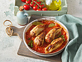 Stuffed peppers in tomato sauce