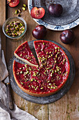 Upside down plum cake with pistachios