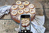 IPhone photos of Linzer cookies with powdered sugar
