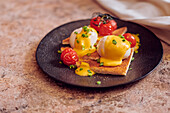 Egg Benedict with tomatoes