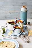 Tomato and pesto soup with crackers