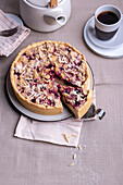 Vegan blackberry cheesecake with almonds and crumble