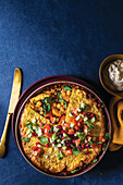 Chicken curry pie with chickpea and feta crust