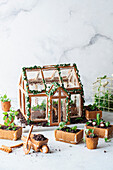 Gingerbread house for spring with edible chocolate soil