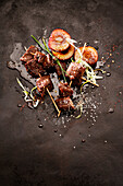 Asian beef skewers with caramelised plums