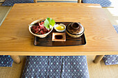 Setto (typical Japanese set), sashimi with rice, nori and soya sauce