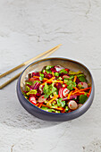 Raw vegetable salad with an Asian flavour