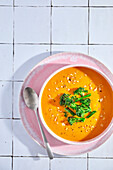 Carrot and ginger soup with wild broccoli