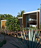 Beach house, wooden deck as a path in front of bedroom