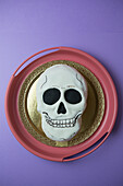 White Halloween skull cake