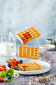 Floating waffles with rhubarb sauce