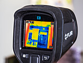 Thermal imaging camera assessing heat loss