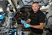 Danish astronaut Andreas Mogensen processing blood samples