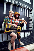 Young couple with boom box