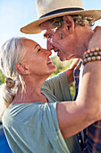 Senior couple hugging and kissing