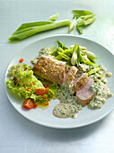 Pork fillet in herb and mustard sauce