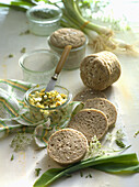 Egg spread with wild garlic and goutweed served with bread from the jar