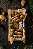 Christmas sweets and nuts in a wooden box