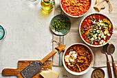 Tortilla soup with black beans, miso lentil and cabbage soup, orzo chickpea soup