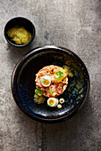 Char tartare with quail eggs and char caviar