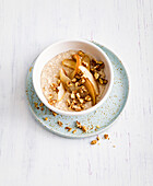 Pear porridge with almond drink and walnuts