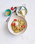 Wholemeal pasta with avocado cream, hemp and pecorino