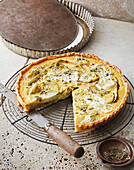 Goat's cheese and leek quiche with artichokes