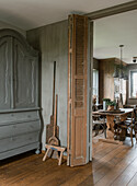 View of country-style dining room with wooden furniture