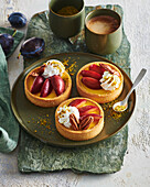 Plum tartlets with custard