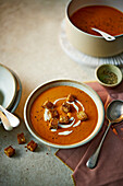 Bell pepper soup with roasted peppers and croutons
