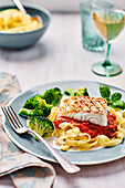 Grilled cod with tomato sauce, tagliatelle and broccoli