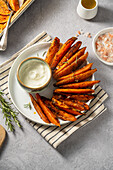 Baked sweet potato wedges with yoghurt dip