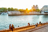 France,Paris,area listed as World heritage by UNESCO,Saint Louis Island,Orleans Pier at sunset