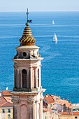 France,Alpes-Maritimes,Menton,bell tower of the Immaculate Conception chapel,or White Penitents and the Bay of the Soleil