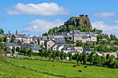 France,Cantal,Regional Natural Park of the Auvergne Volcanoes,monts du Cantal (Cantal mounts),vallee de Cheylade (Cheylade valley),Apchon,the village and the castle ruins located on top of a basaltic dyke