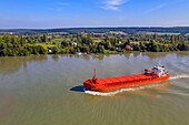 France,Seine-Maritime,Pays de Caux,Norman Seine River Meanders Regional Nature Park,the general cargo ship Merit going up the Seine at Mesnil sous Jumieges (aerial view)