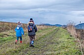 France,Puy de Dome,Billom,two child on a dirt track