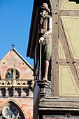France,Haut Rhin,Alsace Wine Route,Colmar,house called Zum Kragen in rue des Marchands,the draper is carrying his height gauge