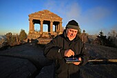 France,Bas Rhin,The temple of Donon is at 1,009 meters above sea level,It was erected at the top in 1869,It is the work of the Colombian architect Louis Michel Boltz,Discovery of the Donon site with Mr Yves Henriques,dowser magnetizer,he evaluates the power of the site with his pendulum