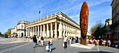 France,Gironde,Bordeaux,area classified as World Heritage,le Triangle d'Or,Quinconces district,Place de la Comédie,Sanna,the statue of Jaume Plensa and the National Opera of Bordeaux or Grand Theatre,built by the architect Victor Louis from 1773 to 1780