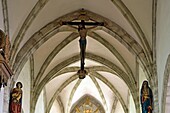 France,Doubs,Mouthier Haute Pierre,Saint Laurent church dated 15th century,entrance of the choir,statue dated 15th century,Christ on the cross,The Virgin,Saint Jean,formed the ordeal of the old beam of Glory