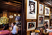 France,Seine Maritime,Rouen,place du Vieux Marché,the restaurant La Couronne in a half-timbered house from 1345 is the said to be the oldest inn in France,portrait of famous customers hanging on the walls