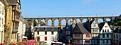 France,Finistere,Morlaix,place Allende,house of the Queen Anne,16 th century half timbered house and the viaduct in the background
