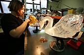 France,Bas Rhin,Wingen sur Moder,Lalique factory of Wingen on Moder,the cold hall,some parts of the piece of crystal are protected by a resin which will resist the sanding,Lalique is a French luxury company,founded by the master glassmaker and French jewelery designer Rene Lalique in 1888