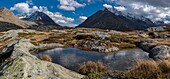 France,Savoie,Haute Maurienne,Val Cenis,Mont Cenis Pass,panoramic view of sky torment Coulours lakes above the small Mont Cenis and rock Etache