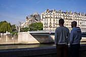 France,Paris,Notre Dame de Paris Cathedral,two days after the fire,April 17,2019,tourists watching the cathedral from Saint Louis Island