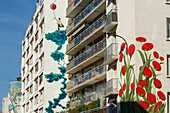 France,Paris,street art,frescos by Anis named Sur Son Arbre Perchee in the background,by Bertrand Bellon,Les Ballons in the middle and Mercedes Uribe,La Mongolfiere in the foreground in Rue du Retrait