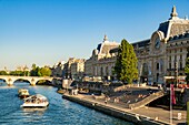 France,Paris,area listed as World Heritage by UNESCO,the banks of the Seine,a boat bus in front of the Musee d'Orsay