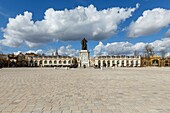 France,Meurthe et Moselle,Nancy,Stanislas square (former royal square) built by Stanislas Leszczynski,king of Poland and last duke of Lorraine in the 18th century,listed as World Heritage by UNESCO,statue of Stanislas,Arc de Here (Here arch),the 2 pavillions,Amphitrite fountain (1751) by Barthelemy Guibal railings and ironworks by Jean Lamour and Saint Epvre basilica bellfry in the background
