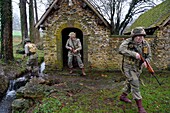 France,Eure,old wash-house of Sainte Colombe prés Vernon,Allied Reconstitution Group (US World War 2 and french Maquis historical reconstruction Association),reenactors in uniform of the 101st US Airborne Division